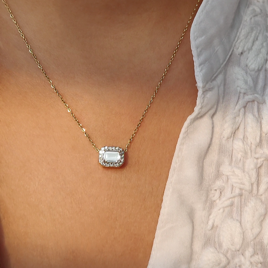 East West Emerald Solitaire Bezel Pendant