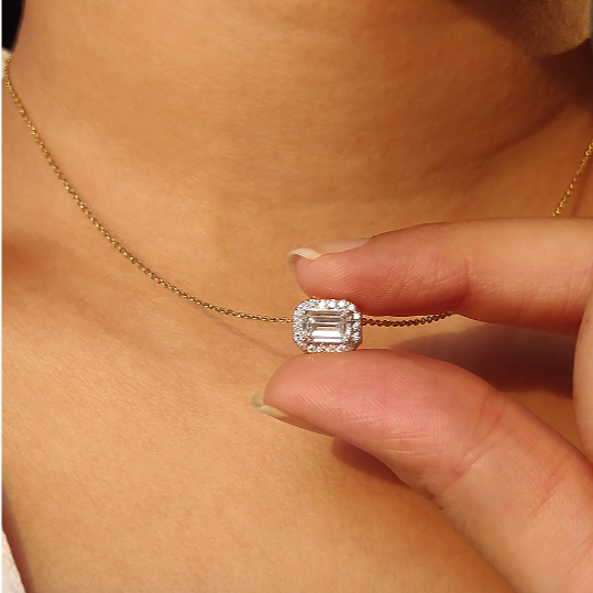 East West Emerald Solitaire Bezel Pendant