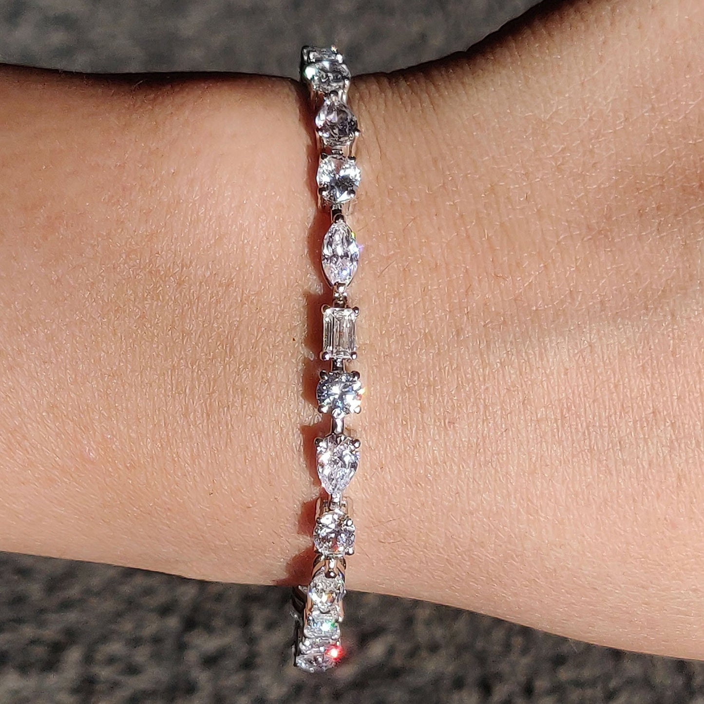 Multi-shape diamond tennis bracelet (6.5ct)