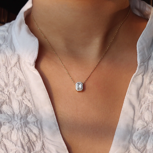 East West Emerald Solitaire Bezel Pendant