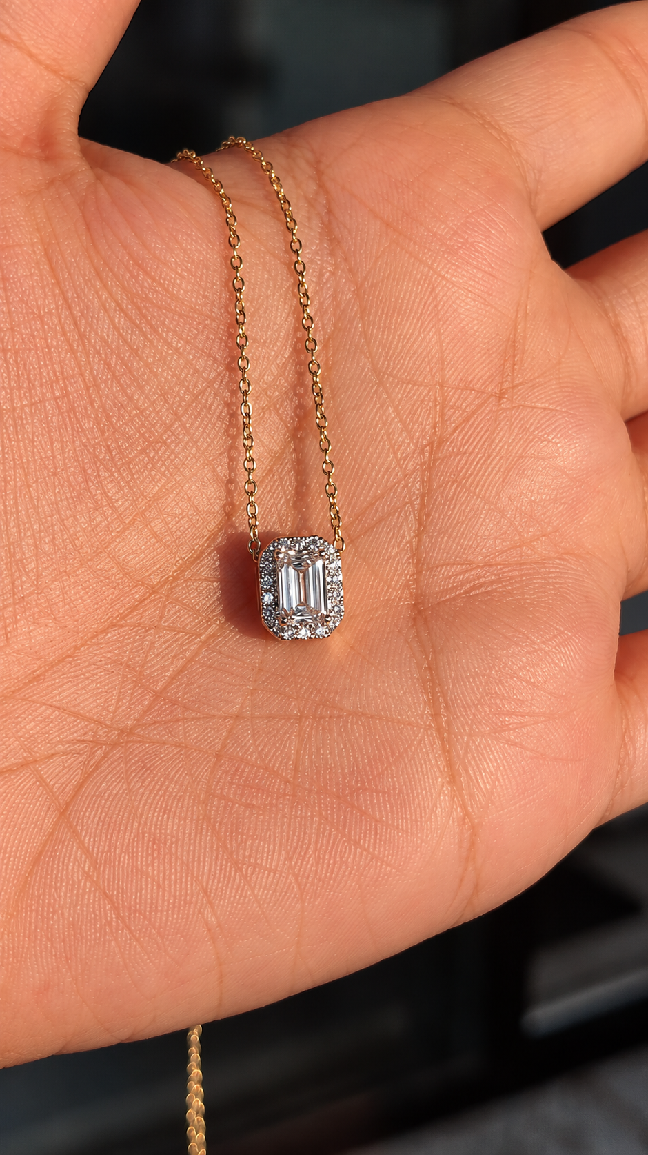 East West Emerald Solitaire Bezel Pendant