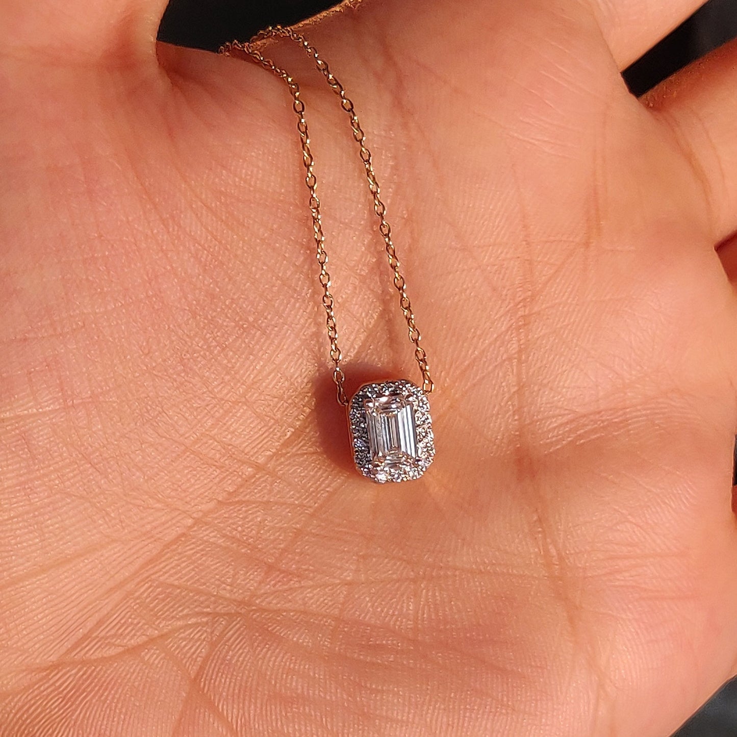 East West Emerald Solitaire Bezel Pendant