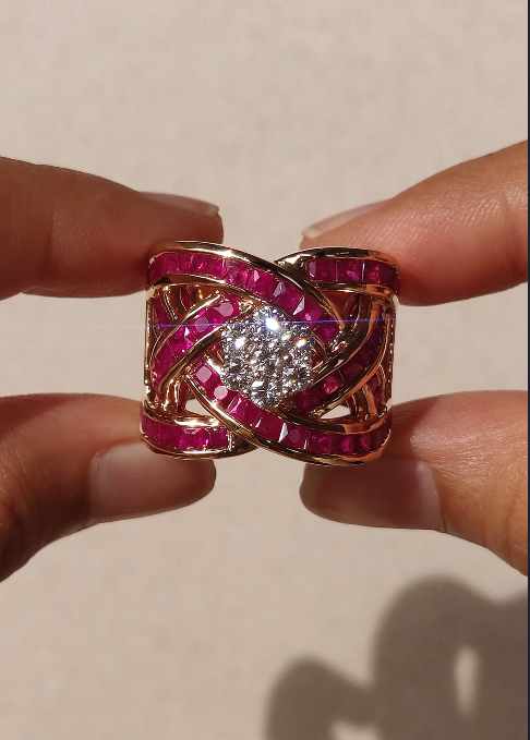 Cross over ruby ring
