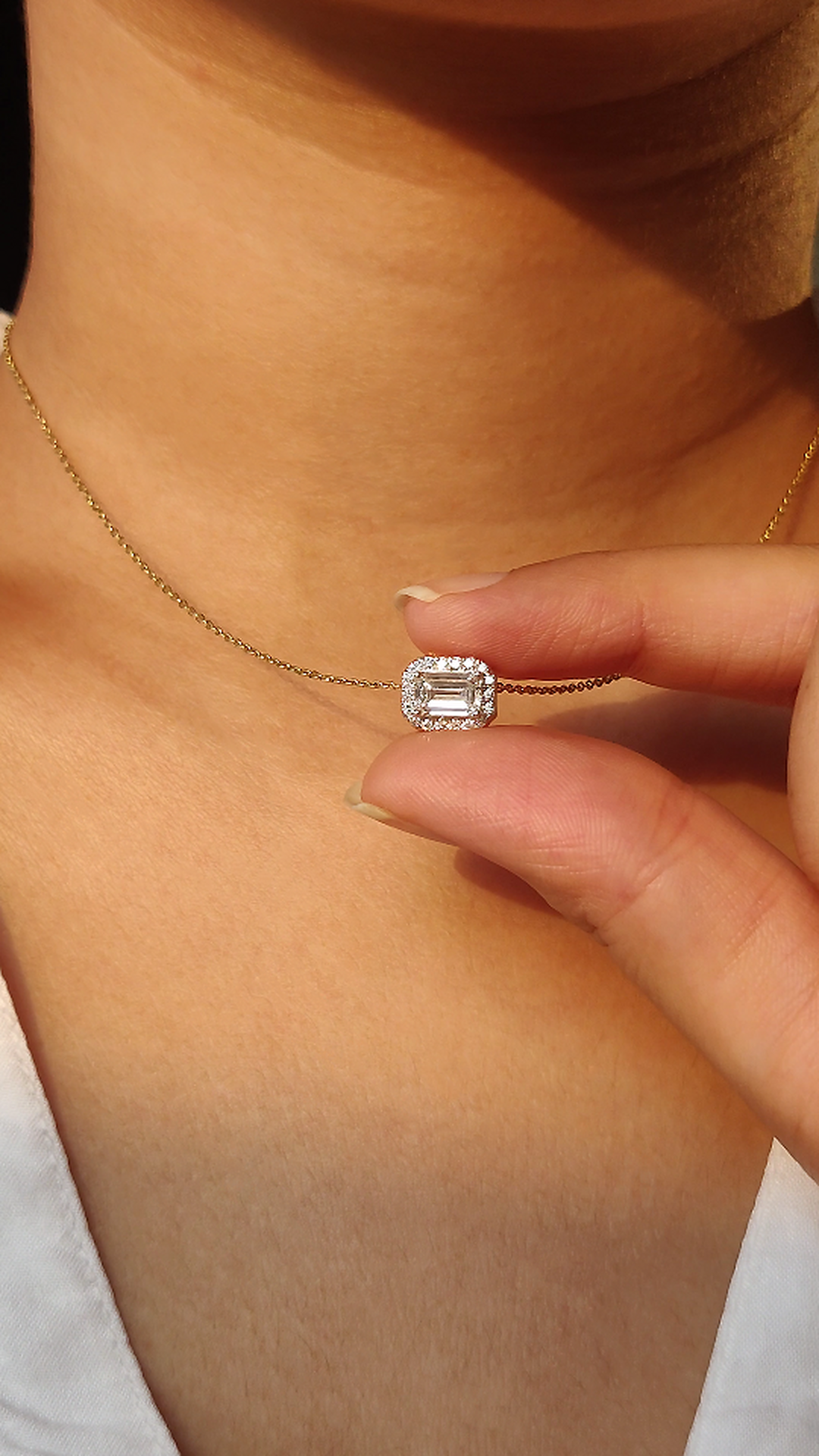 East West Emerald Solitaire Bezel Pendant