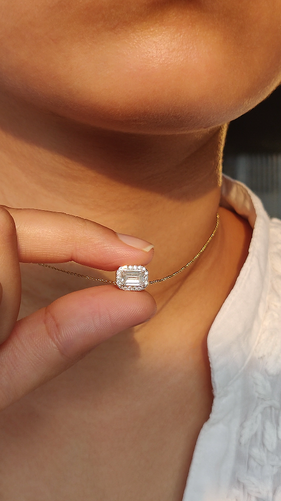 East West Emerald Solitaire Bezel Pendant