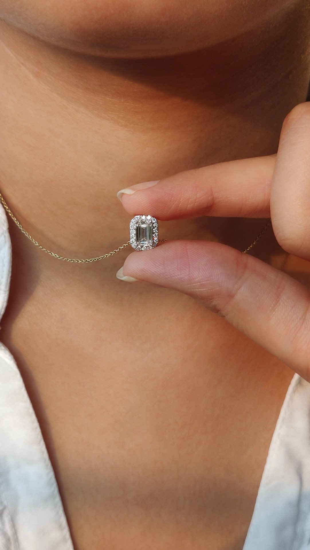 East West Emerald Solitaire Bezel Pendant